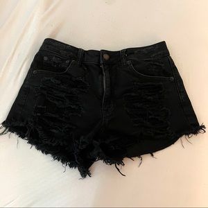 black distressed american eagle shorts